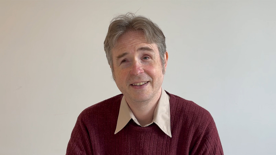 academic headshot of dr daniel rhind